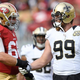 San Francisco 49ers guard Zane Beadles and New Orleans Saints defensive end Paul Kruger shake hands. (Photo: Michael C. Hebert/New Orleans Saints)